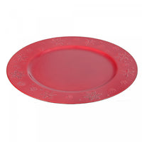 Assiette de présentation rouge ornée de flocons de neige