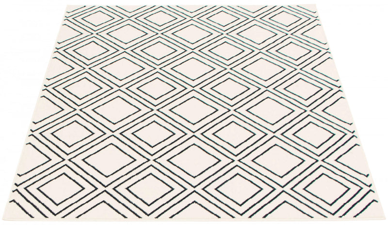 Carpette August blanc géodebleu marine 5 pi 3 po x 7 pi 3 po