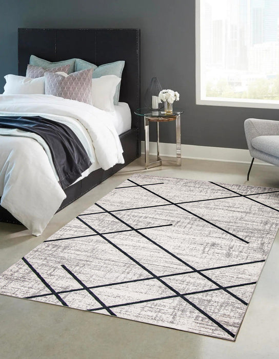 Carpette Damali ivoire et bleue lavable à la machine - 3 pi 0 po x 5 pi 0 po