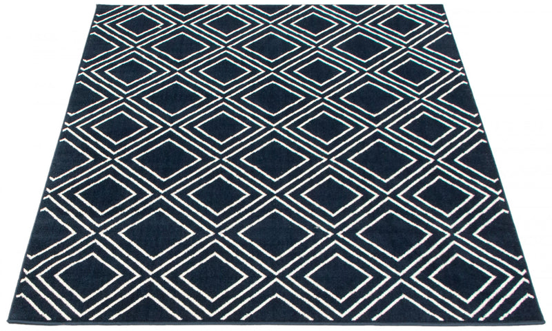 Carpette August bleu marine géodeblanc 5 pi 3 po x 7 pi 3 po