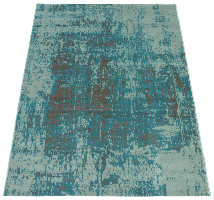 Carpette Mariam turquoise 5 pi 3 po x 7 pi 7 po