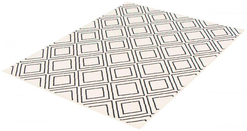 Carpette August blanc géodebleu marine 6 pi 7 po x 9 pi 6 po