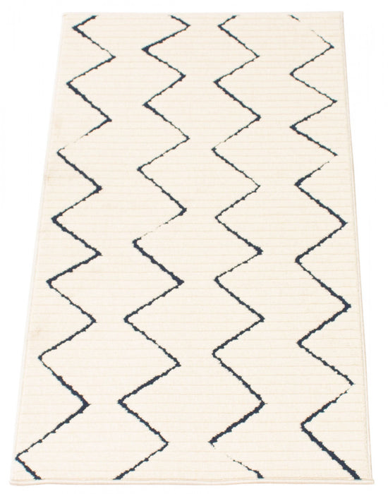 Carpette Kimi bleueivoire 2 pi 8 po x 4 pi 11 po