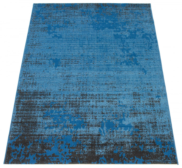 Carpette Janaki bleue 6 pi 7 po x 9 pi 6 po