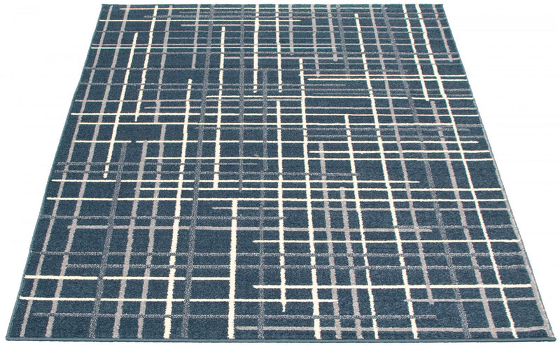 Carpette Taite couleur pétrole - 7 pi 10 pox 10 pi 2 po