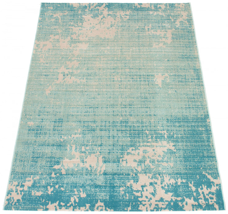 Carpette Janaki bleu sarcelle 5 pi 3 po x 7 pi 7 po