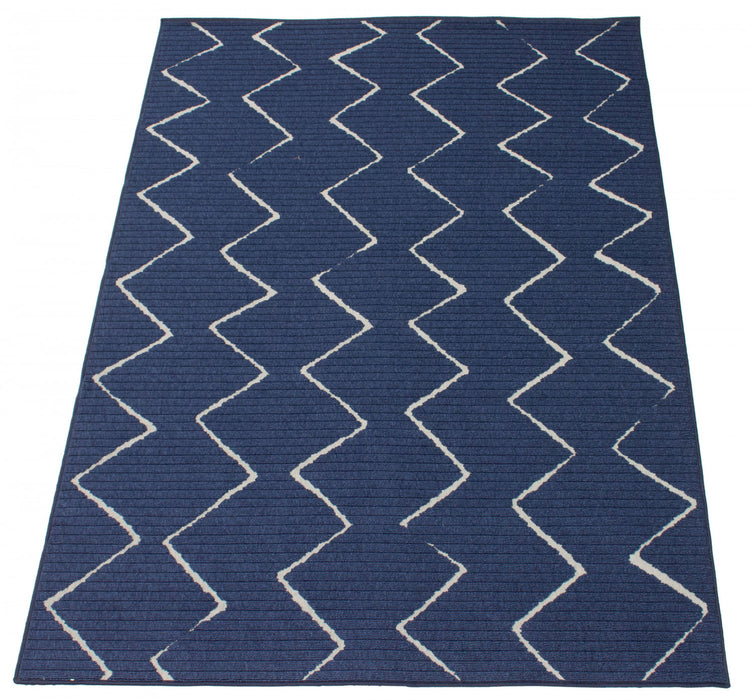 Carpette Kimi bleue 6 pi 7 po x 9 pi 6 po
