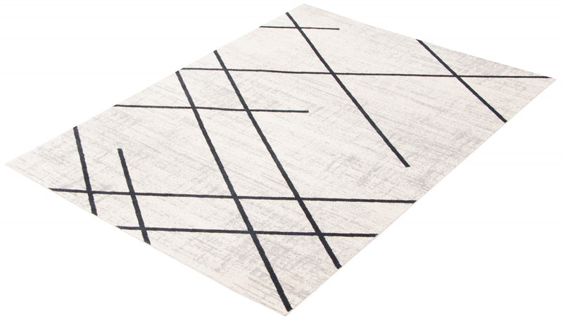 Carpette Damali ivoire et bleue lavable à la machine - 5 pi 0 po x 7 pi 0 po