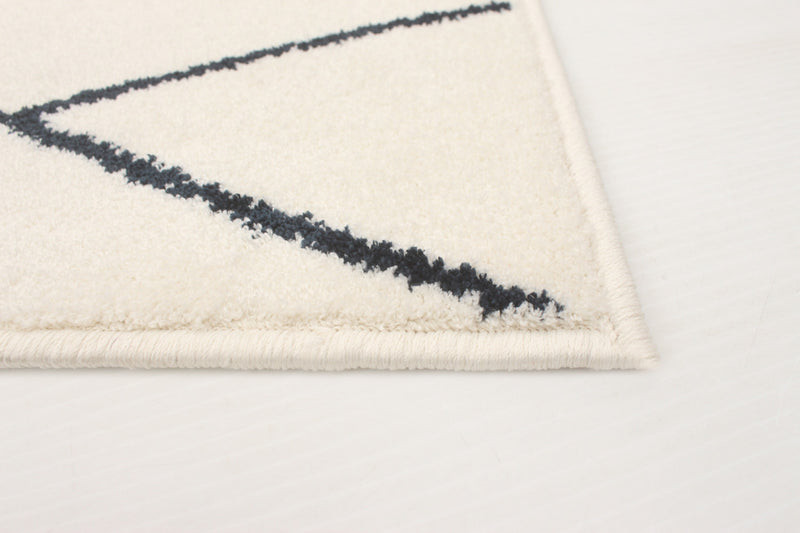 Carpette August blanchebleu marine 7 pi 10 po x 10 pi 2 po