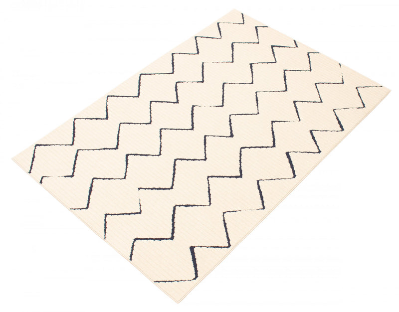 Carpette Kimi bleueivoire 3 pi 11 po x 5 pi 7 po