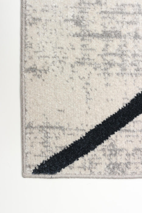 Carpette Damali ivoire et bleue lavable à la machine - 3 pi 0 po x 5 pi 0 po