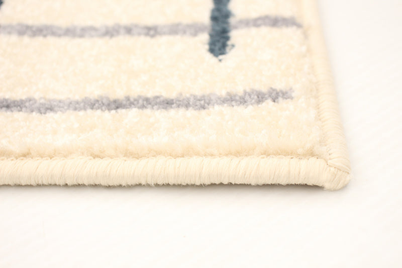 Carpette Taite crème-couleur pétrole - 3 pi 11 pox 5 pi 7 po
