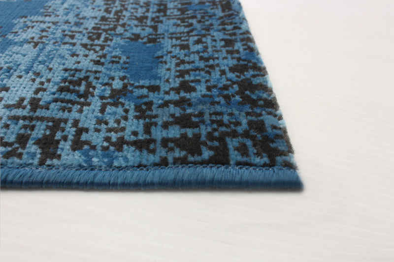 Carpette Janaki bleue 6 pi 7 po x 9 pi 6 po