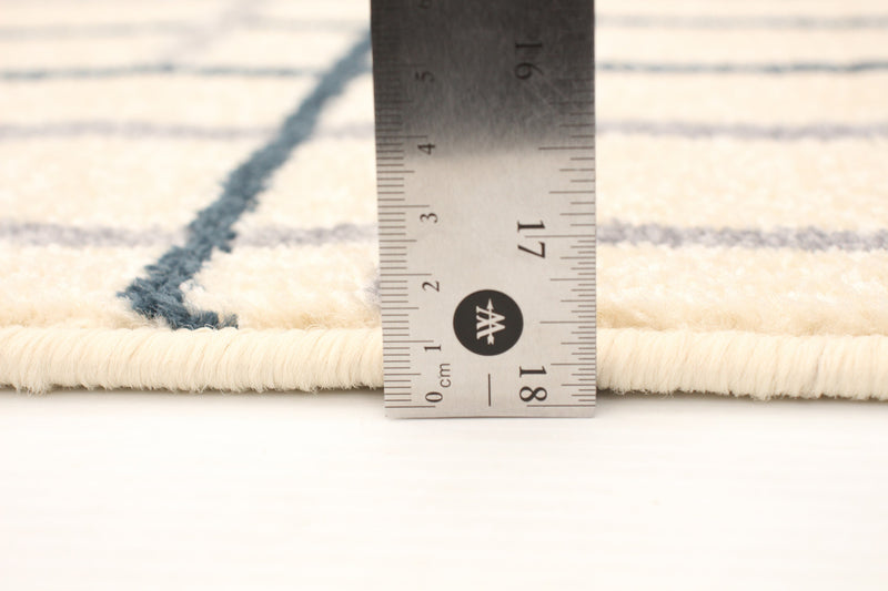 Carpette Taite crème-couleur pétrole - 3 pi 11 pox 5 pi 7 po