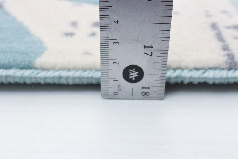 Carpette Ira turquoise 4 pi 7 po x 6 pi 7 po