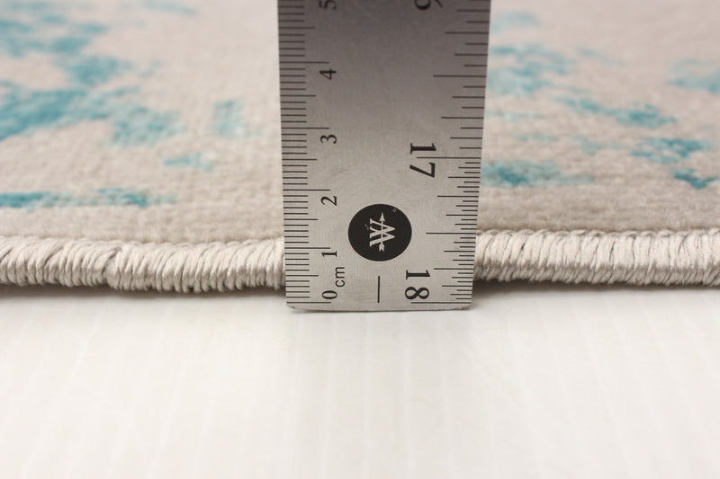 Carpette Corinne turquoise 5 pi 3 po x 7 pi 7 po