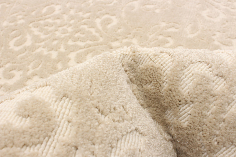 Carpette Caledonia ivoire 6 pi 7 po x 9 pi 6 po