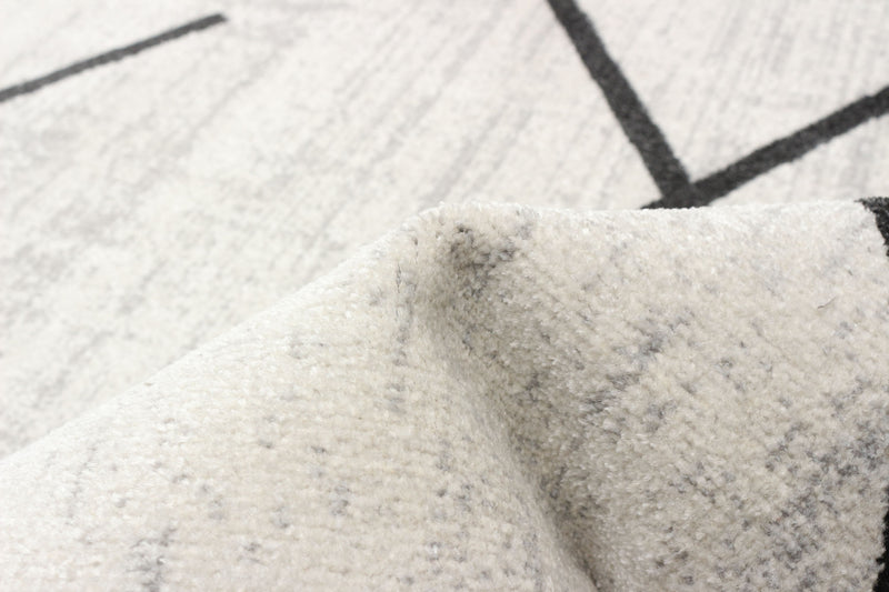 Carpette Damali ivoire et noire lavable à la machine - 8 pi 0 po x 10 pi 0 po