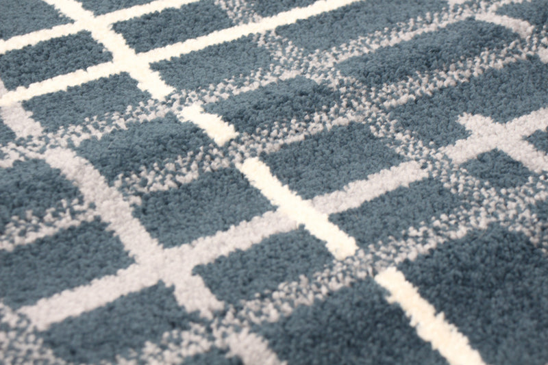 Carpette Taite couleur pétrole - 7 pi 10 pox 10 pi 2 po