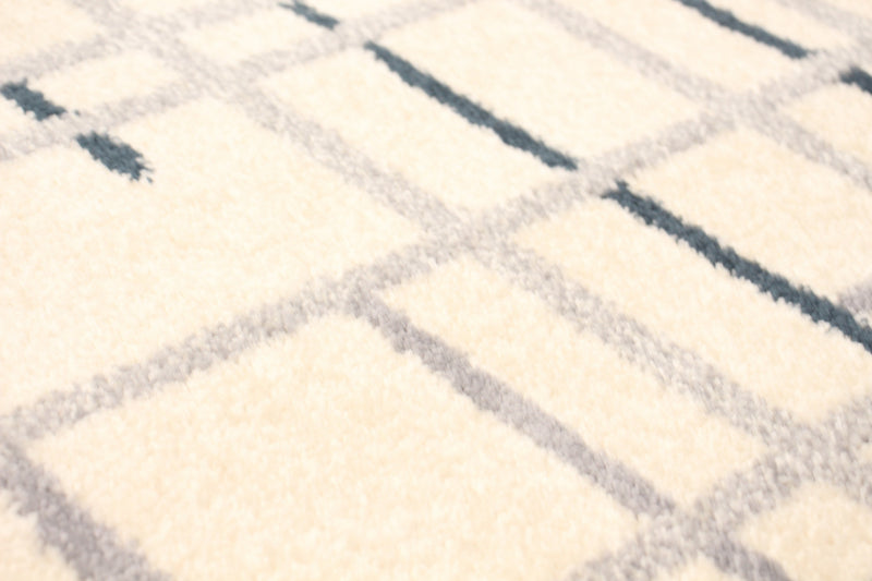 Carpette Taite crème-couleur pétrole - 3 pi 11 pox 5 pi 7 po
