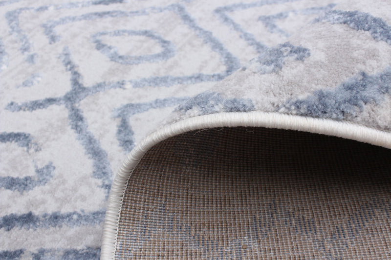 Carpette Dita bleue - 7 pi 10 po x 10 pi 2 po