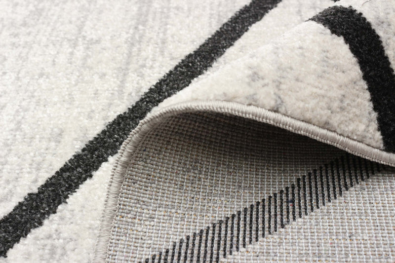 Carpette Damali ivoire et noire lavable à la machine - 8 pi 0 po x 10 pi 0 po