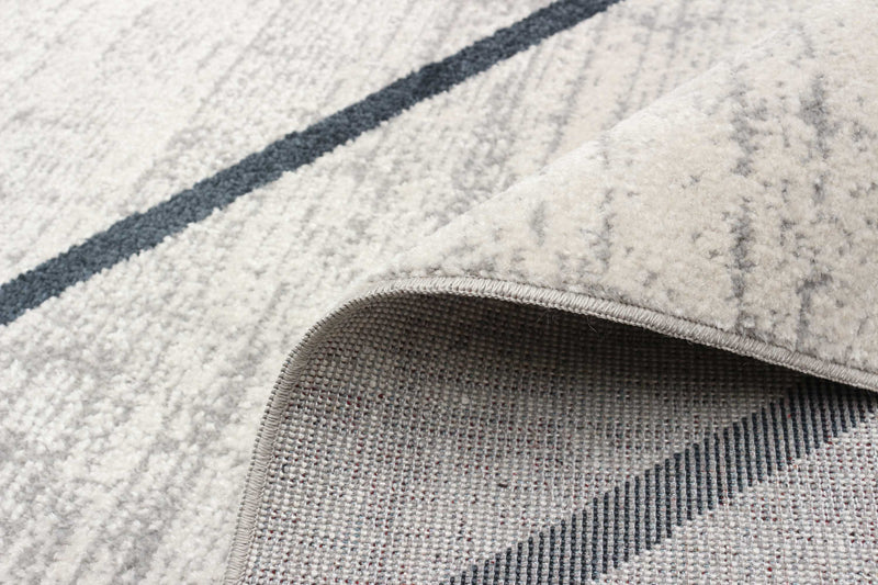 Carpette Damali ivoire et bleue lavable à la machine - 3 pi 0 po x 5 pi 0 po
