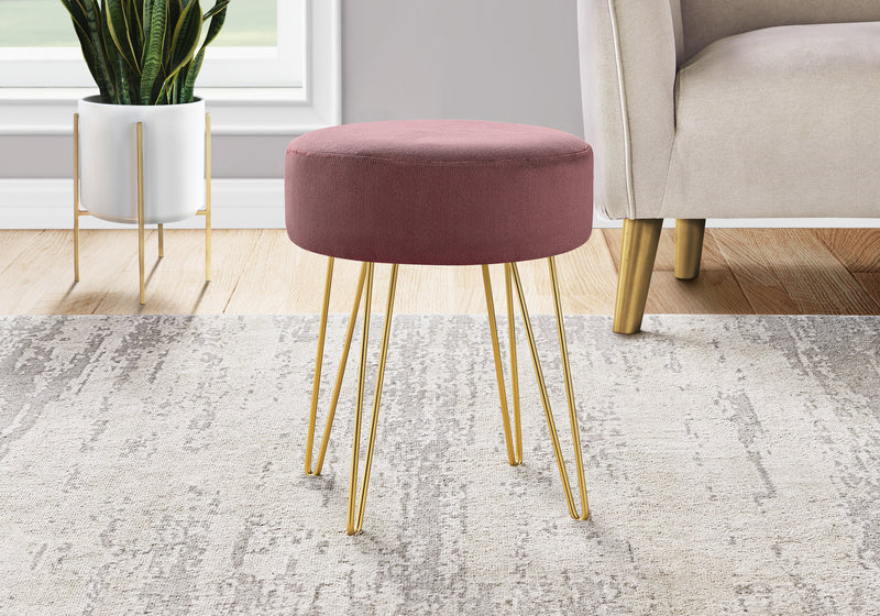 Pouf doré et tissu prune