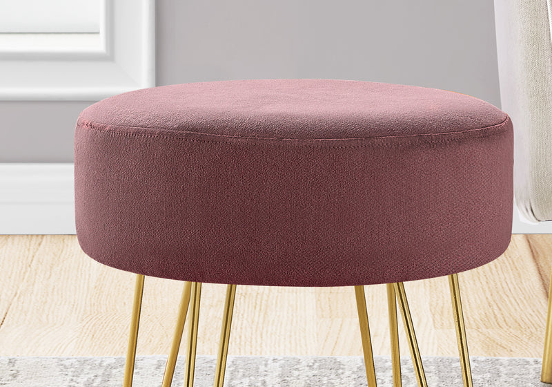 Pouf doré et tissu prune