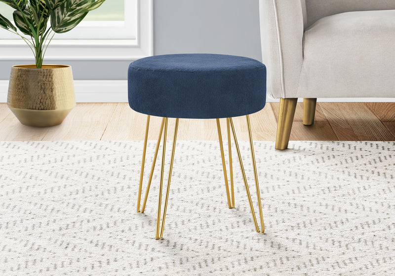 Pouf doré et tissu bleu