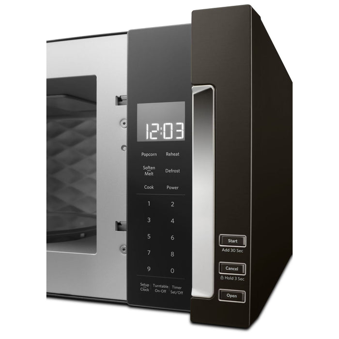 Four à micro-ondes à hotte intégrée mince KitchenAid de 1,1 pi³ avec cuisson à 950 W - acier inoxydable noir avec fini PrintShieldMC - YKMLS311HBS