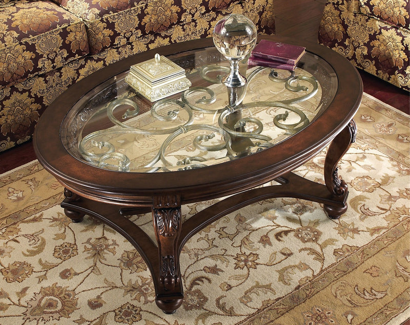 Table à café ovale traditionnelle Valencia de 48 po avec dessus en verre - bois brun foncé avec touches de filigrane